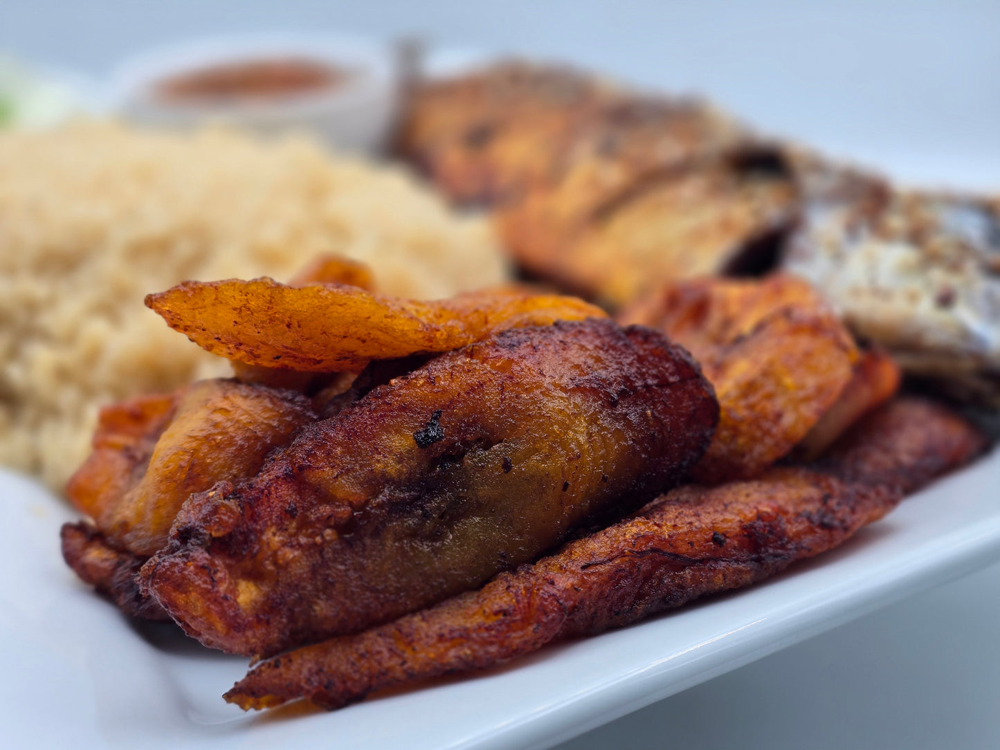 Fish, Fried Plantain, and Attieke - African Lantern