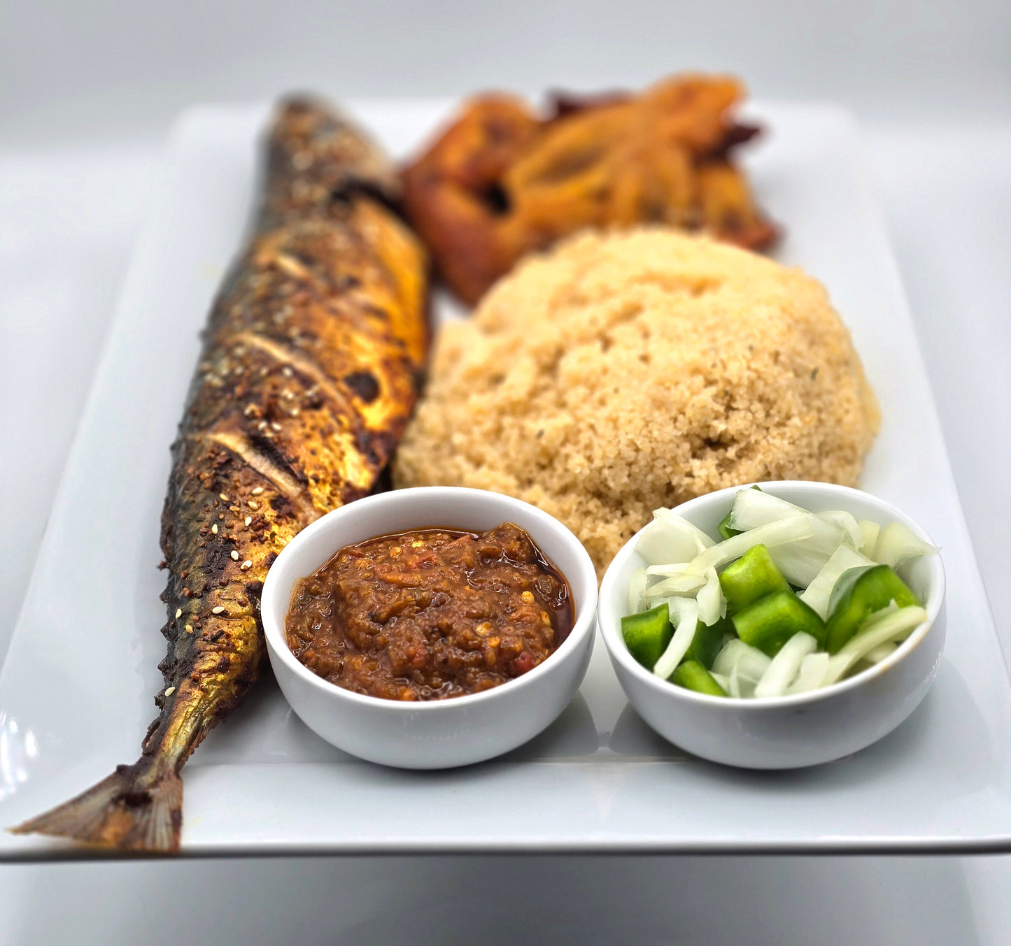 Fish, Fried Plantain, and Attieke - African Lantern